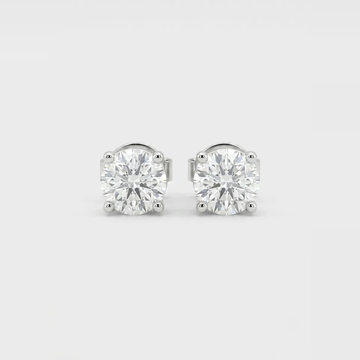Luxury White Gold Lab Diamond Solitaire Stud Earrings - 1.08 CTW