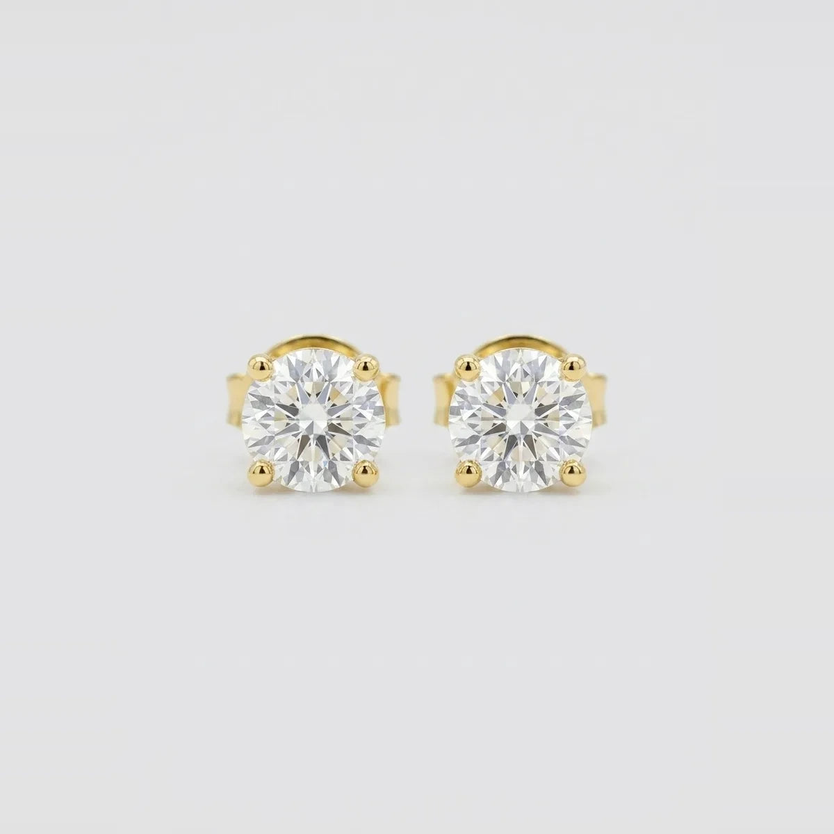 Luxury Yellow Gold Lab Diamond Solitaire Stud Earrings - 1.10 CTW