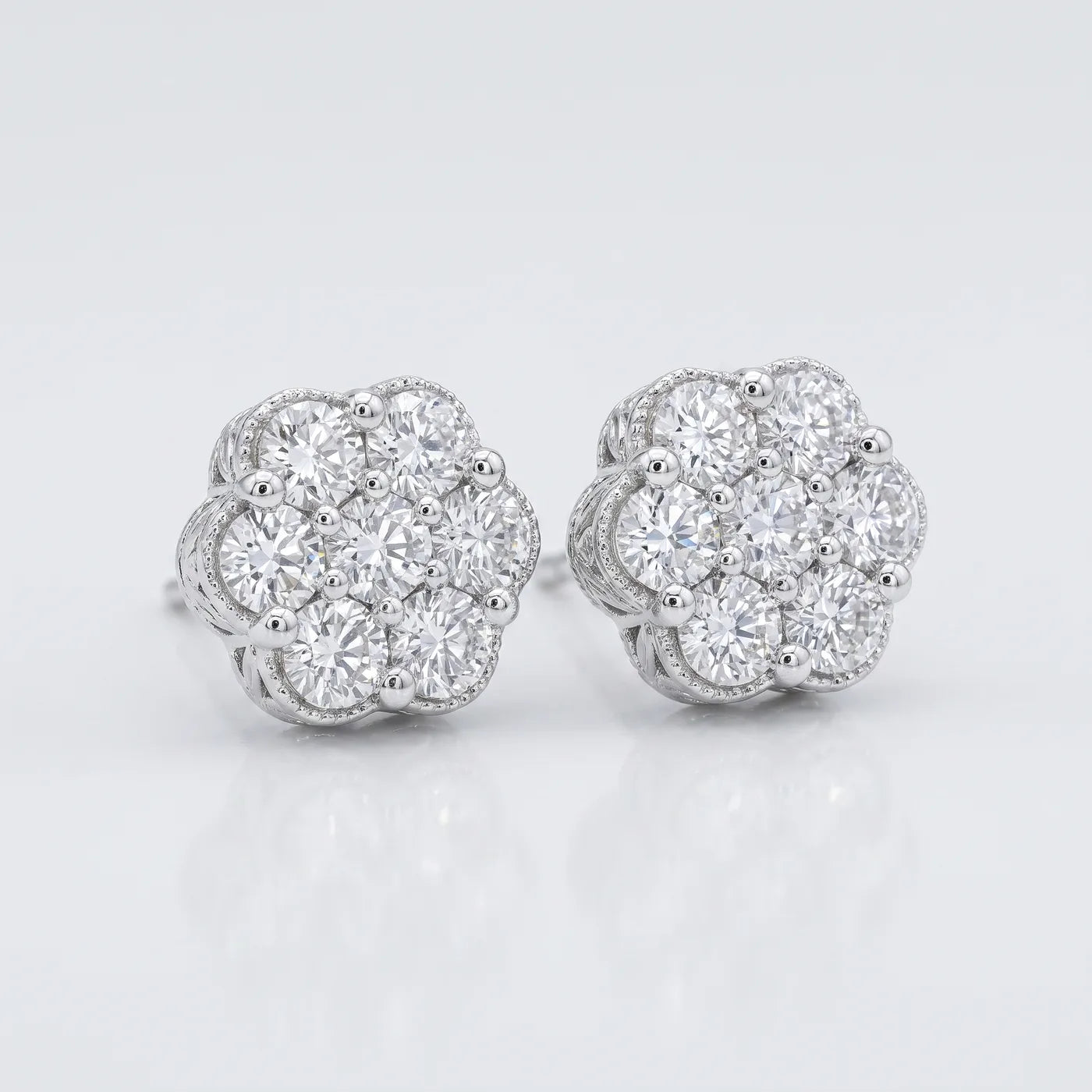 Luxury 925 Sterling Silver Moissanite Round Cluster Stud Earrings - 0.96 CTW — 925 sterling silver · rhodium plated