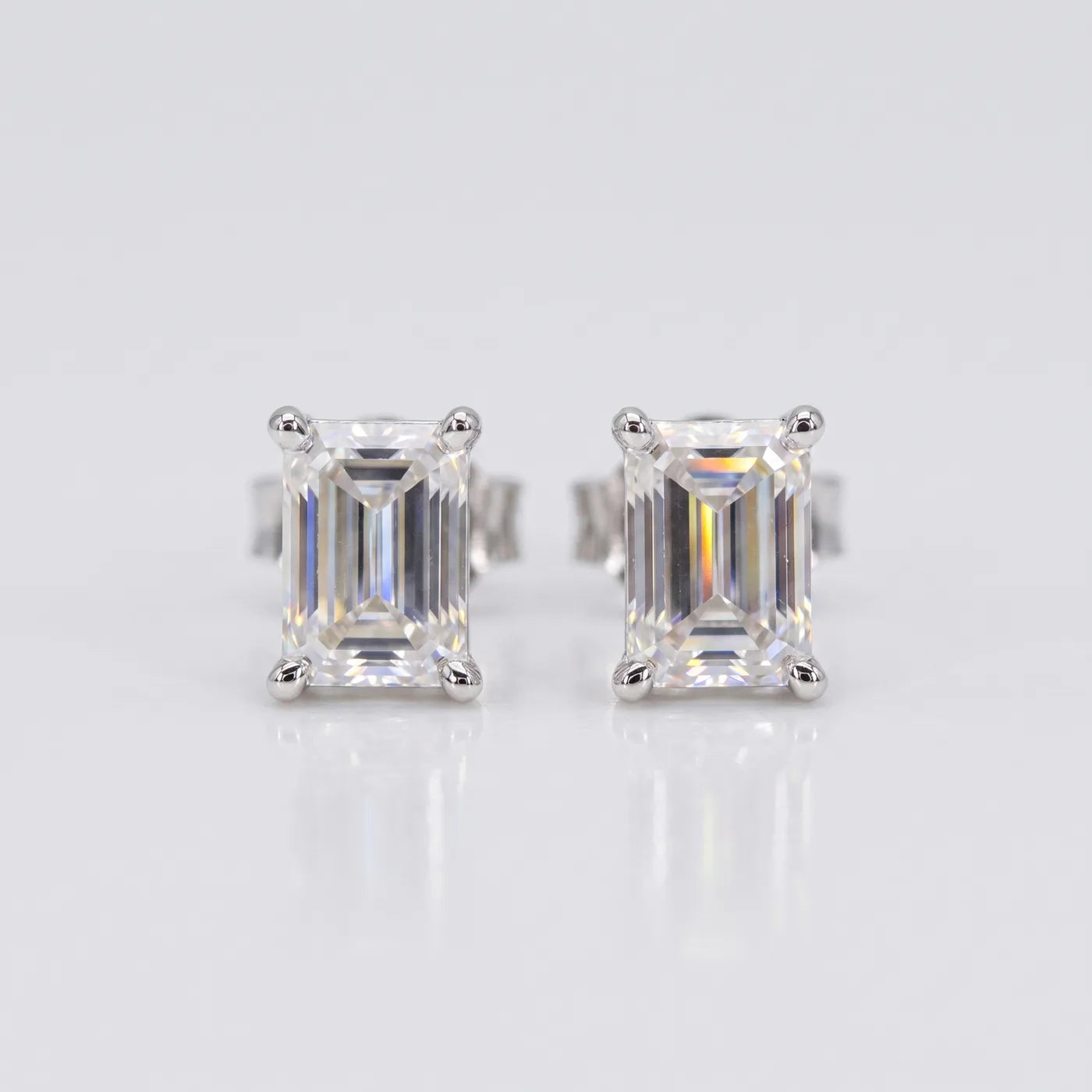 Emerald Cut Stud Earrings — 925 sterling silver · rhodium plated