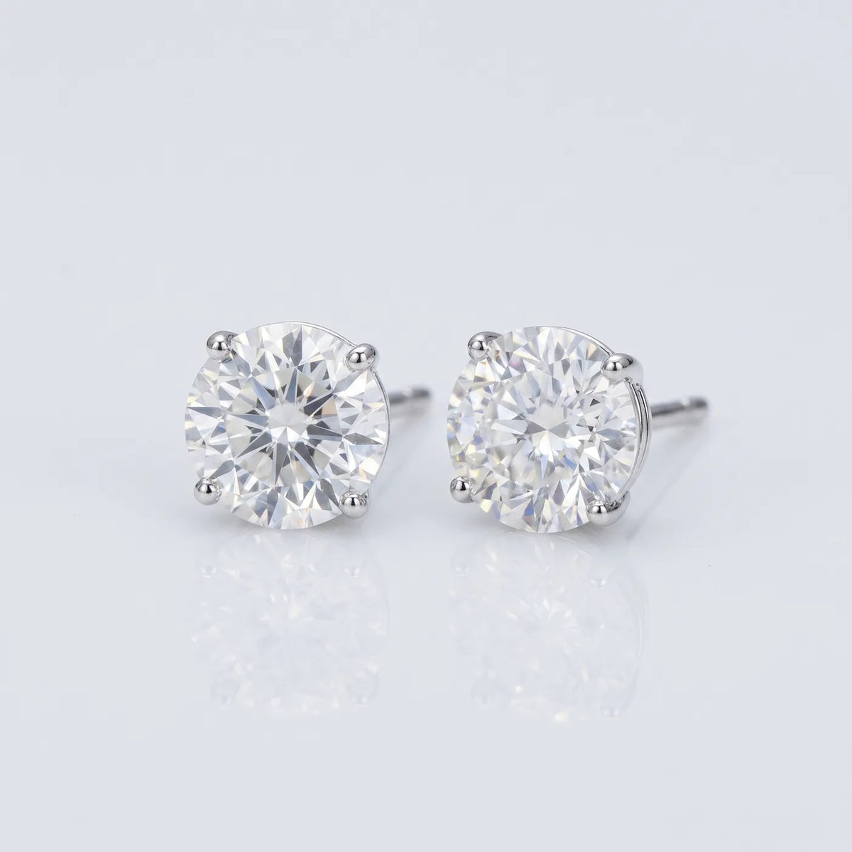 Classic Round Stud Earrings — 925 sterling silver · rhodium plated